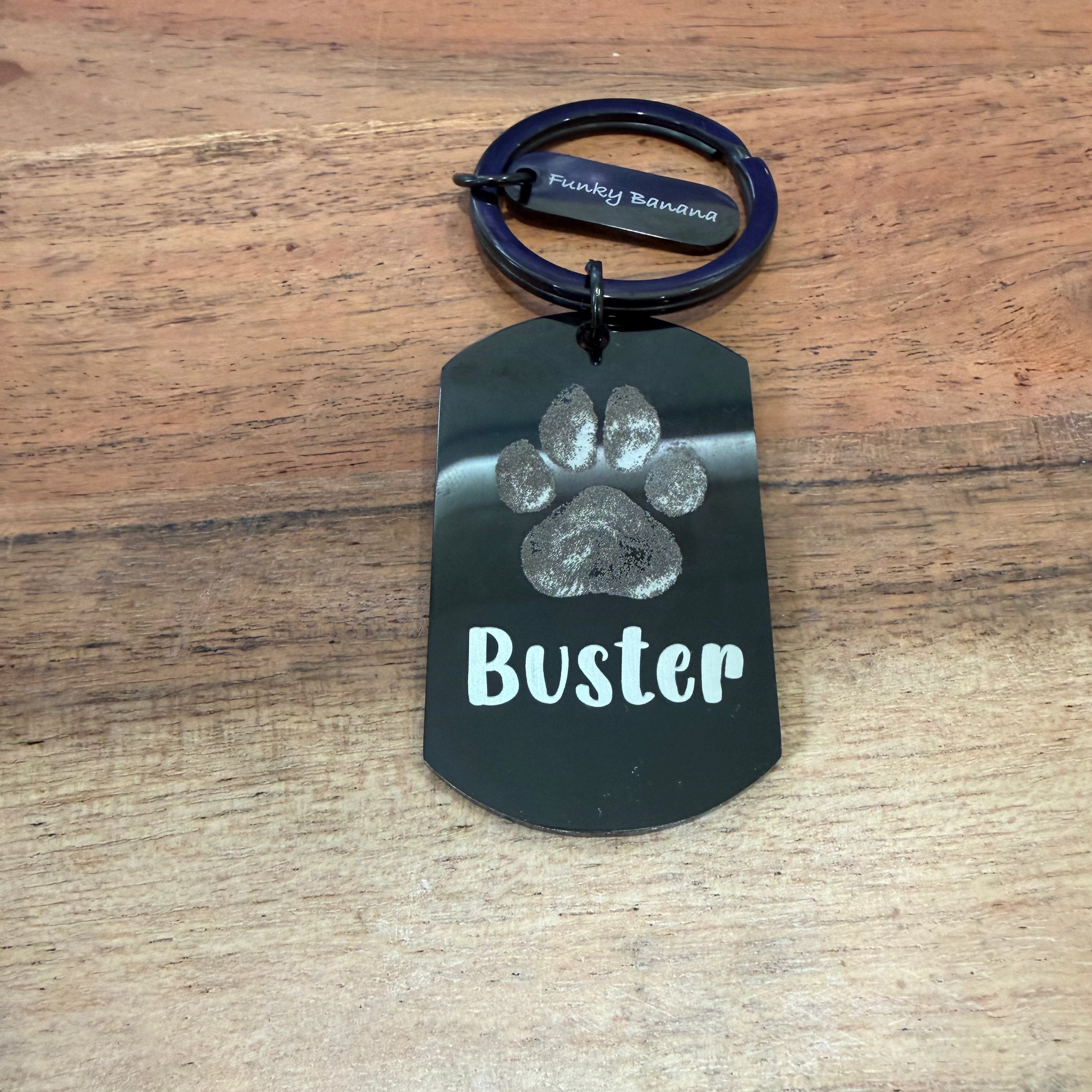 Black paw print keyring personalised